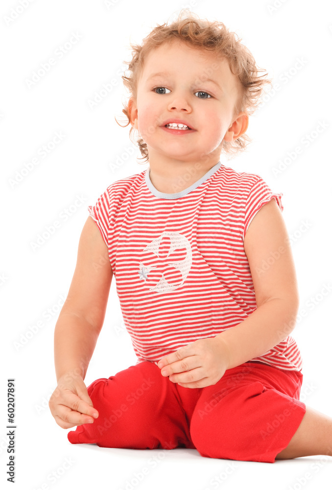 Closeup of a cute girl with curly blonde hair smiling