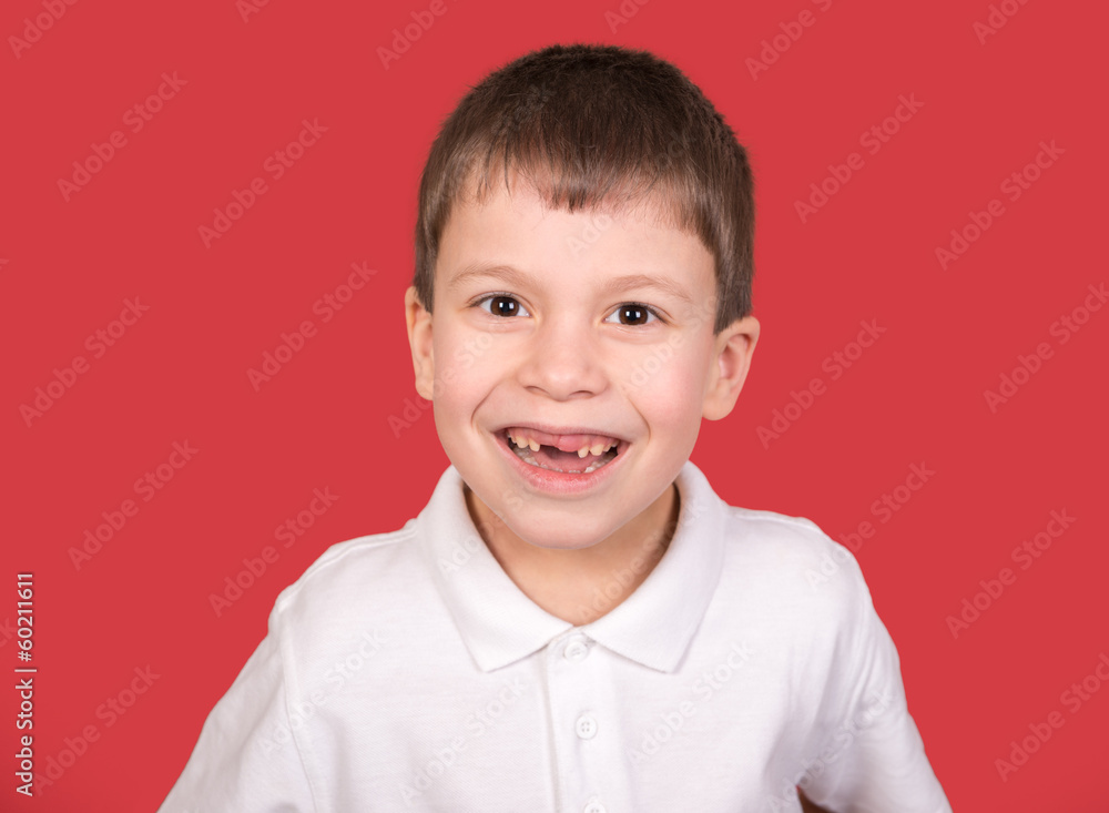 boy portrait in white shirt on red boy portrait in white shirt on red