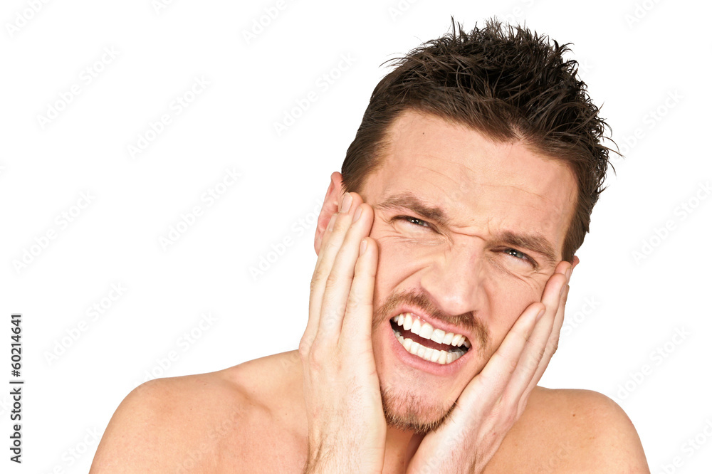 Obraz premium Young man holding your face because suffering from a toothache