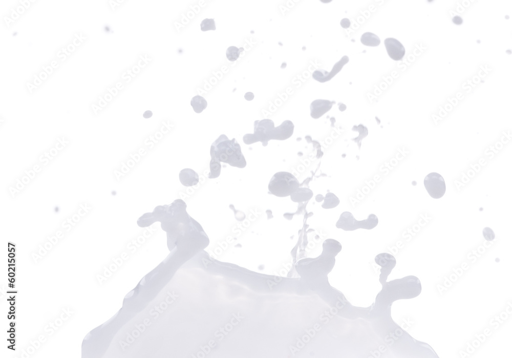 Pouring milk splash on white background Pouring milk splash on white background
