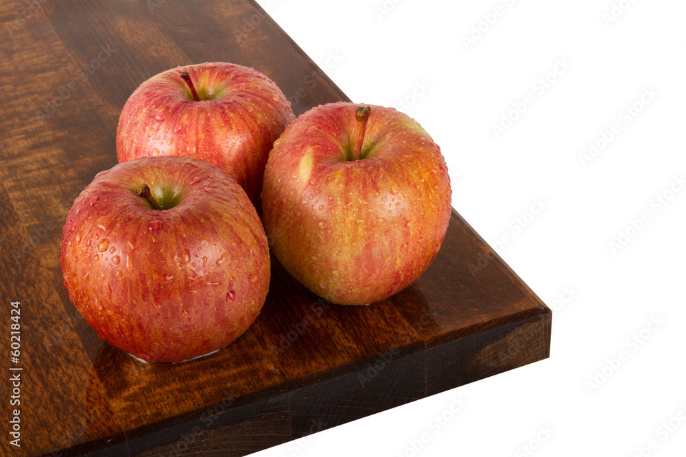 Fresh juicy water-sprinkled apples on white background Fresh juicy water-sprinkled apples on white background