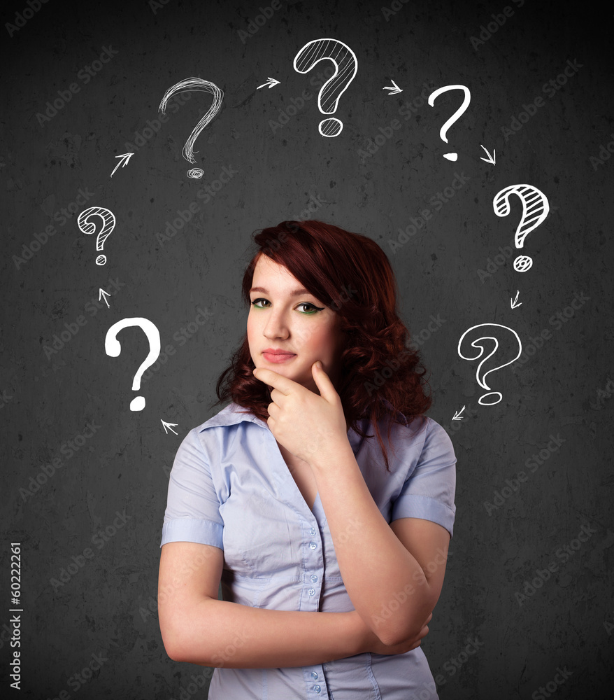 Young woman thinking with question mark circulation around her h Young woman thinking with question mark circulation around her h