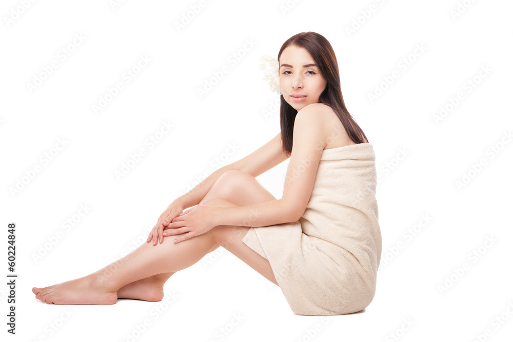 Young beautiful woman wrapped in towel after bath Young beautiful woman wrapped in towel after bath