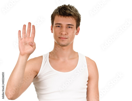 young man shows sign and symbol by hands on white background