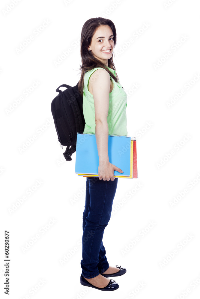 Side view of a female student carring notebooks and backpak, iso Side view of a female student carring notebooks and backpak, iso