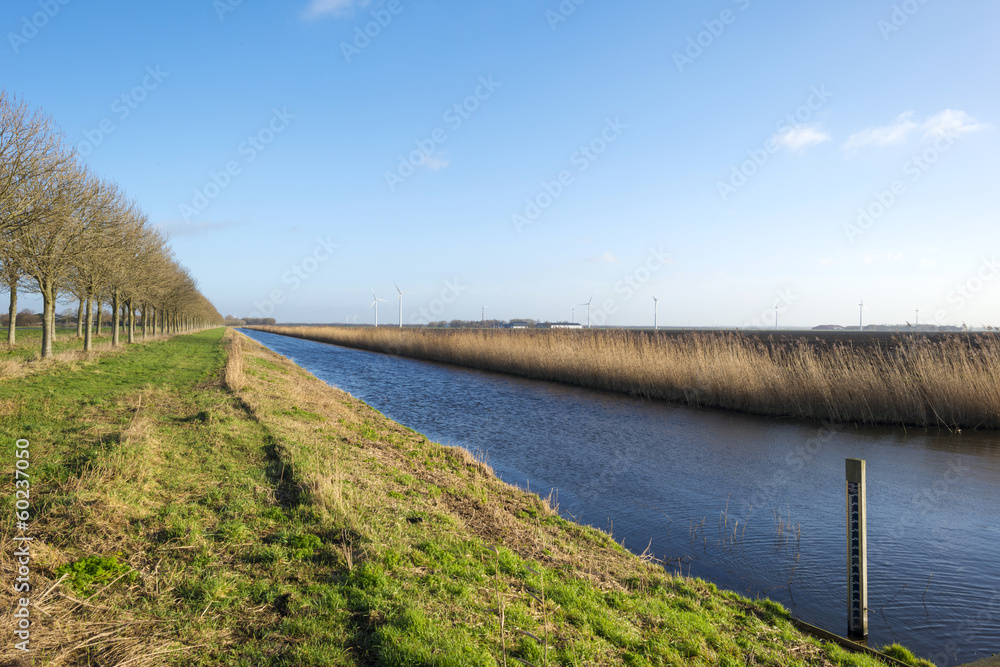 Canal through a rural landscape in winter
