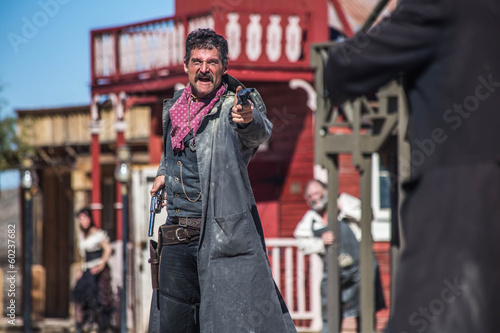 Canvas-taulu Sheriff Duels Bandit in Town