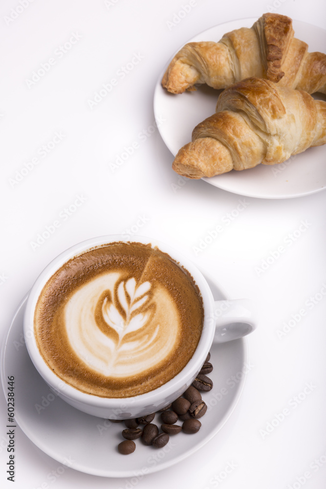Croissant with a cup of latte Croissant with a cup of latte