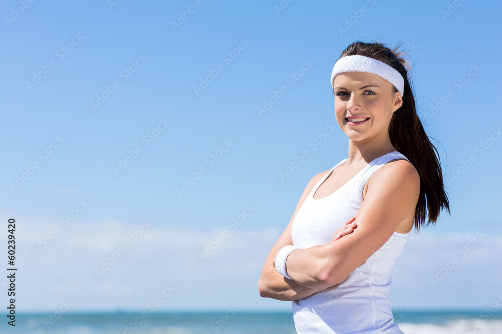 young fitness woman with arms crossed young fitness woman with arms crossed