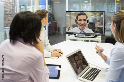 Group Of Business people In video conference during a meeting photo