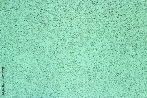 Grain green paint wall background or texture