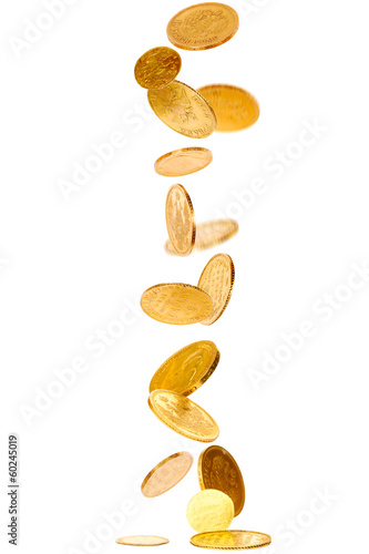Heap of falling old gold coins isolated on white photo