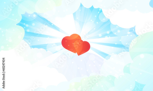 Dwa serca na tle blasku nieba