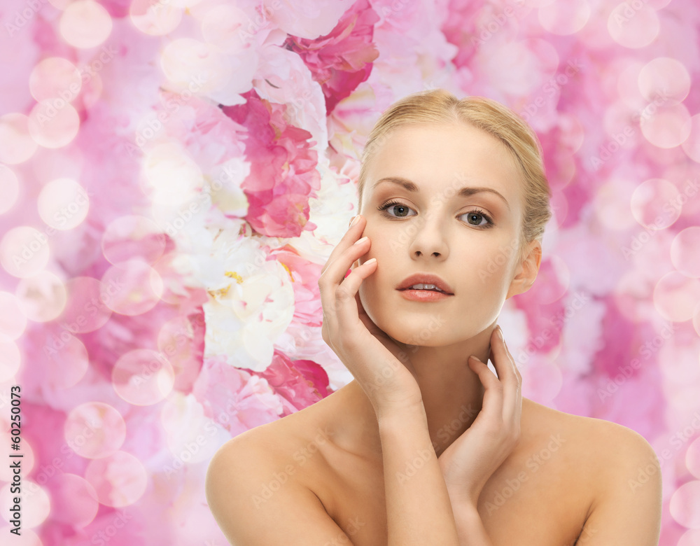 woman touching her face skin woman touching her face skin