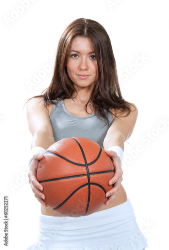 woman holding Basketball ball in hands and give it © Dmitry Lobanov