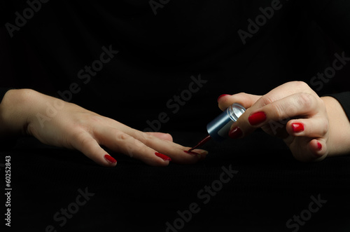 Hands of Young Woman Making Manicure