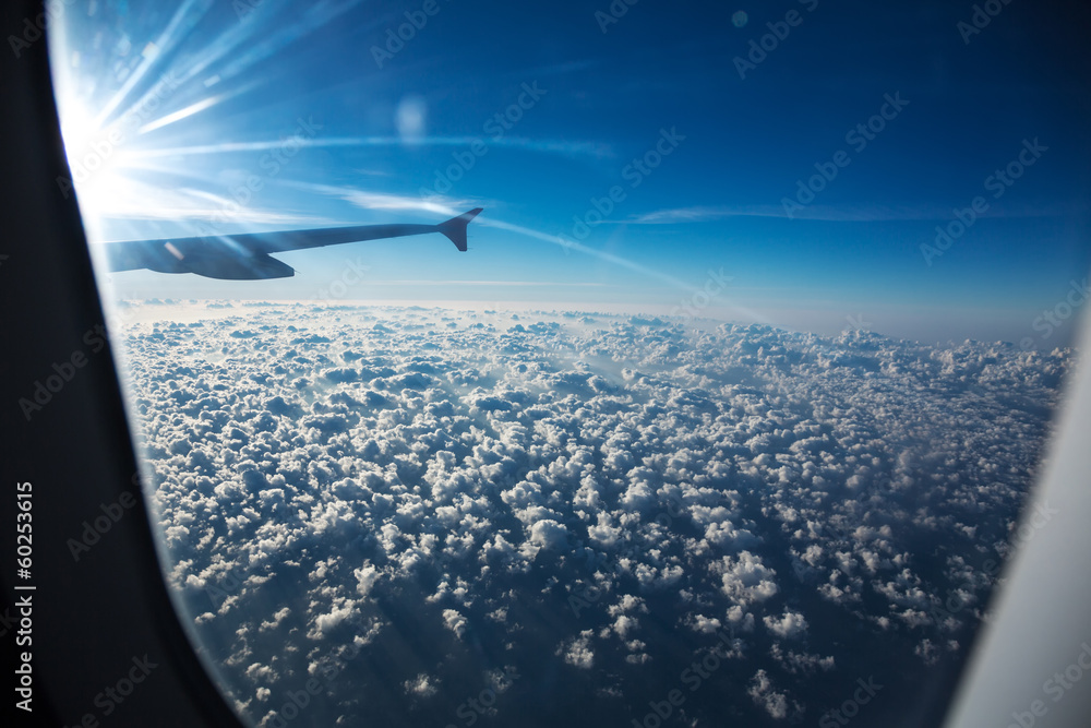 Clouds through an aircraft window Clouds through an aircraft window