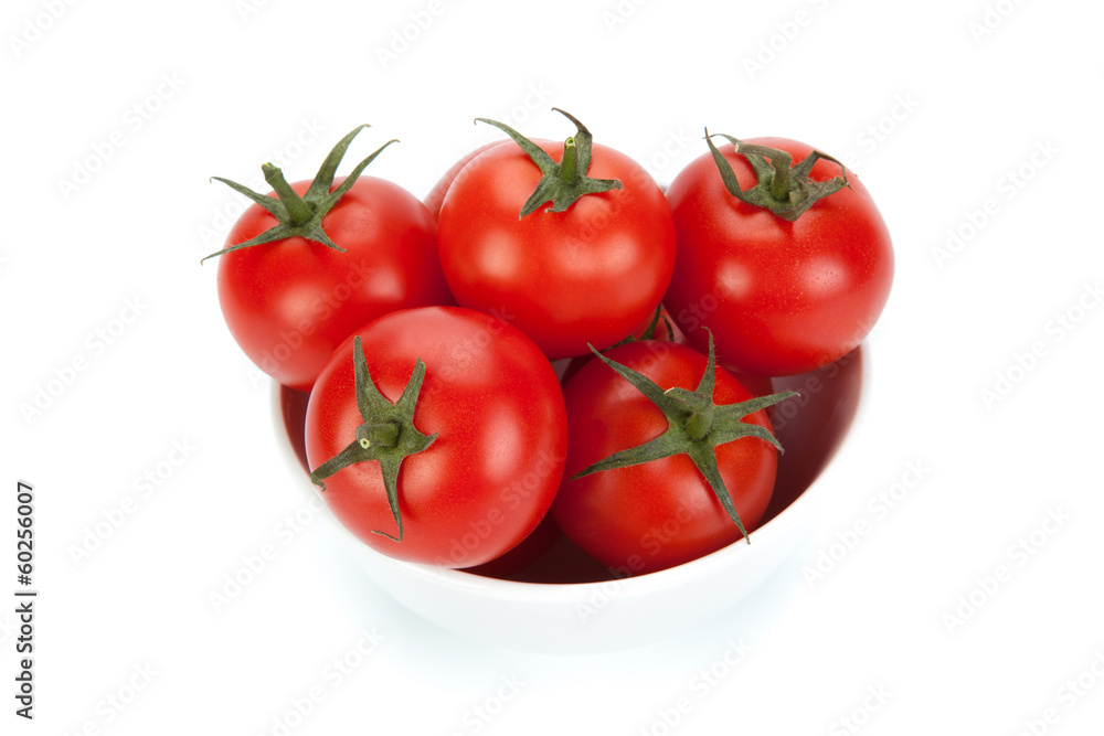 white bowl of red tomatoes on a white background white bowl of red tomatoes on a white background
