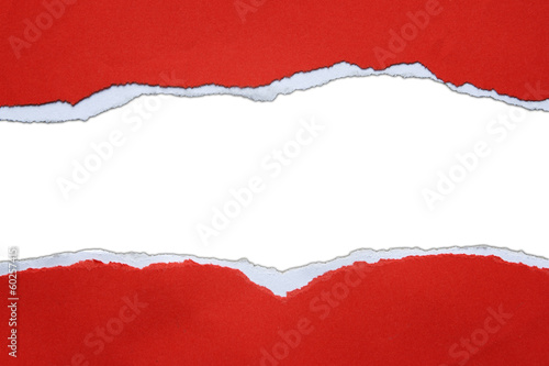 Ripped red paper on white background. Copy space