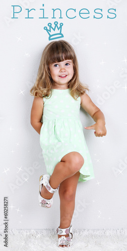 Little cute girl on carpet,...