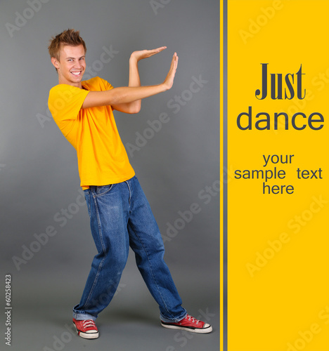 Handsome young man dancing ...