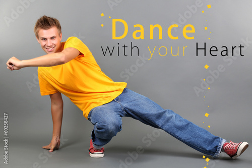 Handsome young man dancing ...