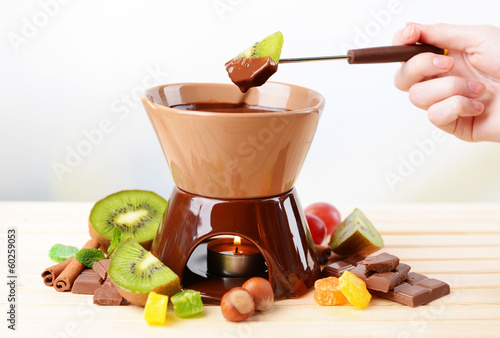 Chocolate fondue with fruits, photo