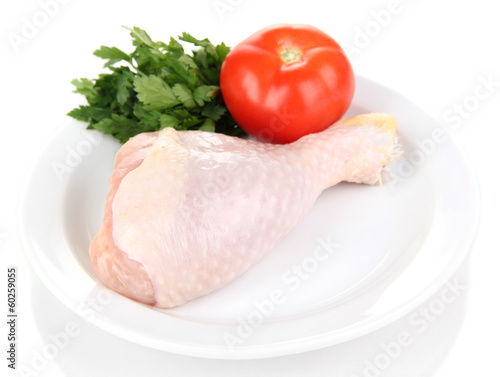 Raw chicken leg isolated on white