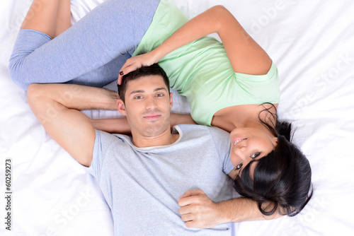 Couple in love in bed