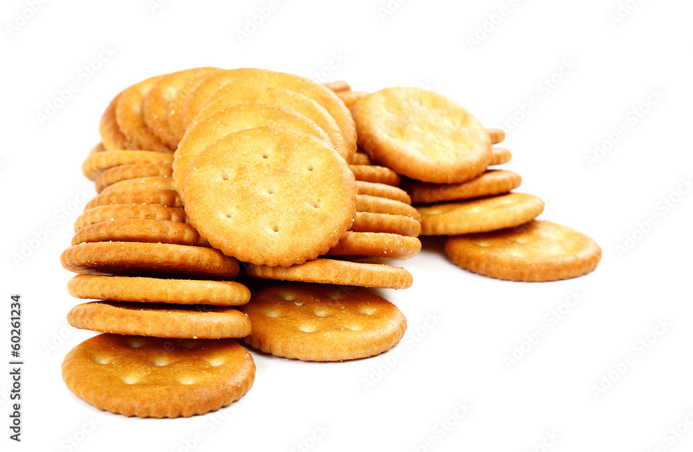 Stack of cracker biscuits on a white background.
