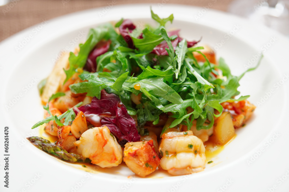 Warm appetizer made of shrimps and vegetables Warm appetizer made of shrimps and vegetables