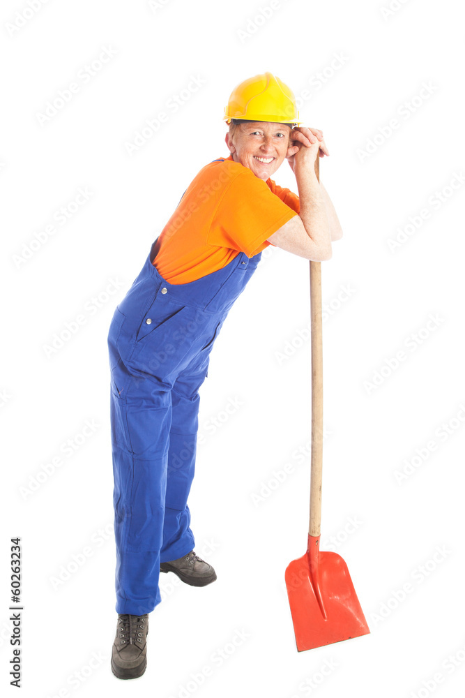 female builder with shovel female builder with shovel