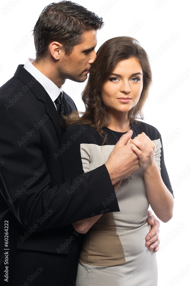 Beautiful young couple in suit and dress Beautiful young couple in suit and dress