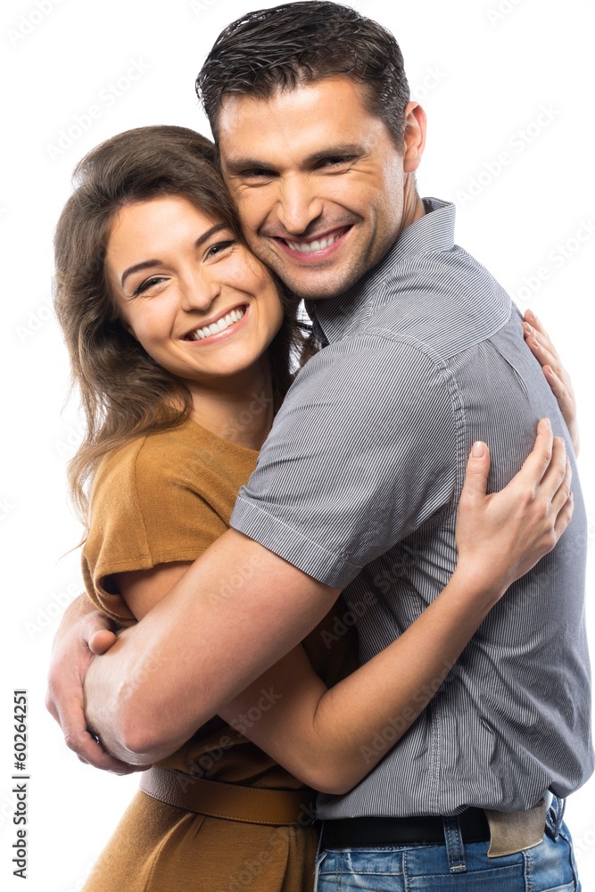 Happy couple in shirt and dress hugging isolated on white Happy couple in shirt and dress hugging isolated on white