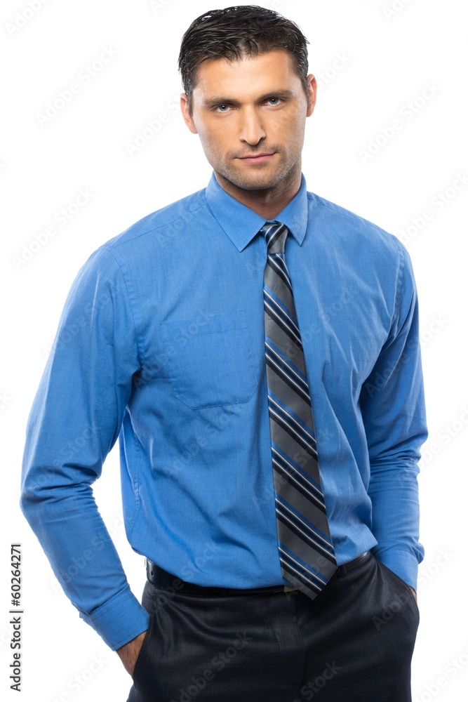 Handsome young man in blue shirt and tie Handsome young man in blue shirt and tie
