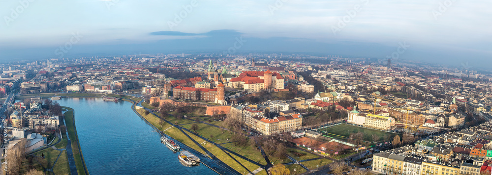 Fototapeta premium Cracow skyline with aerial view of historic royal Wawel Castle a