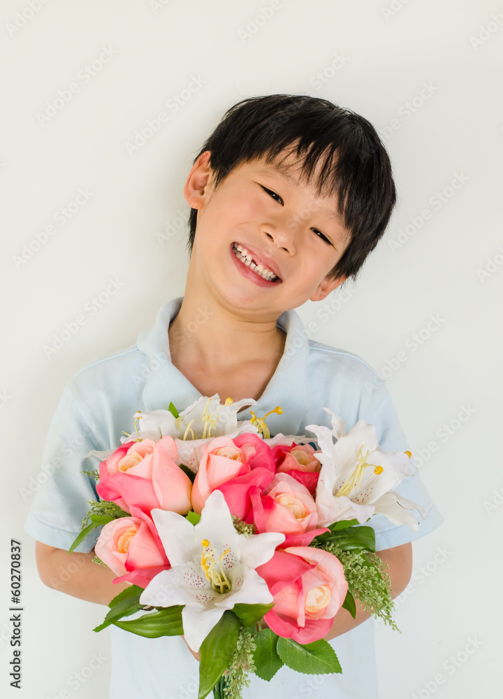 Asian boy holding flower bouquet on white background Asian boy holding flower bouquet on white background
