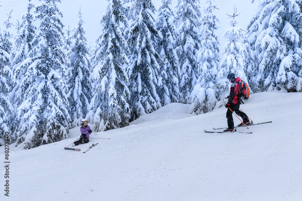 Rescue ski patrol help injured woman skier