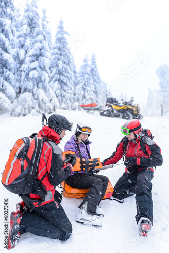Ski patrol team rescue woman broken arm