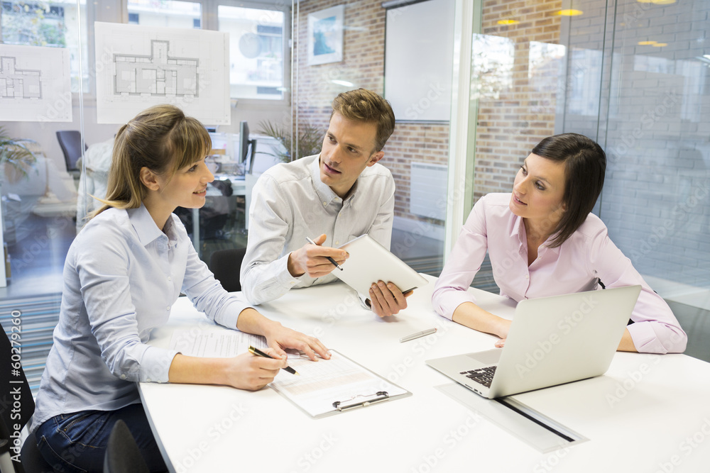 Fototapeta premium Start-up business team in meeting, working on computer