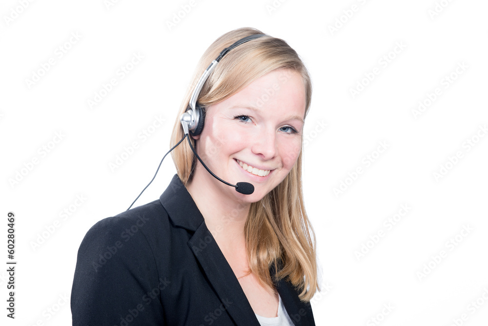Blonde Frau mit Headset beim telefonieren Blonde Frau mit Headset beim telefonieren
