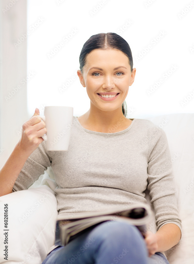 woman with cup of coffee reading magazine at home woman with cup of coffee reading magazine at home