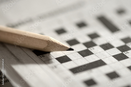 Obraz na plátně Crossword puzzle and pencil