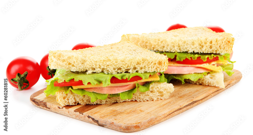 Fresh and tasty sandwiches on cutting board isolated on white Fresh and tasty sandwiches on cutting board isolated on white