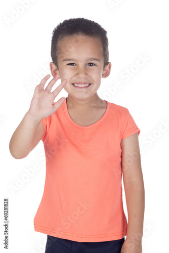 little boy with orange   shirt waving