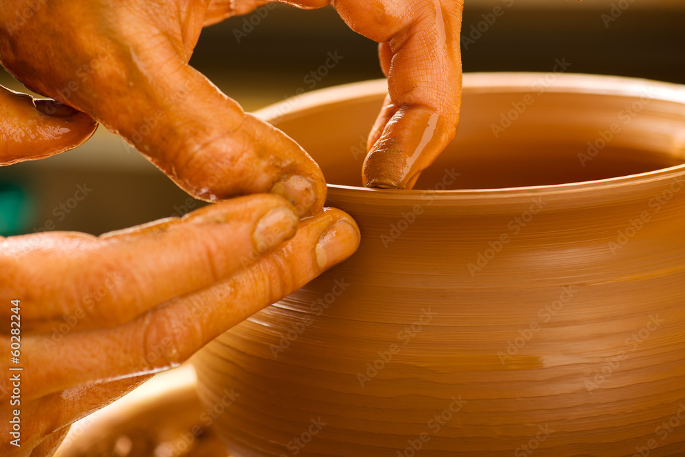 hands of a potter, creating an earthen jar hands of a potter, creating an earthen jar