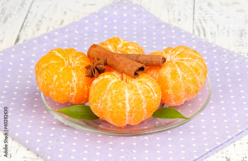 Ripe sweet tangerines with spices