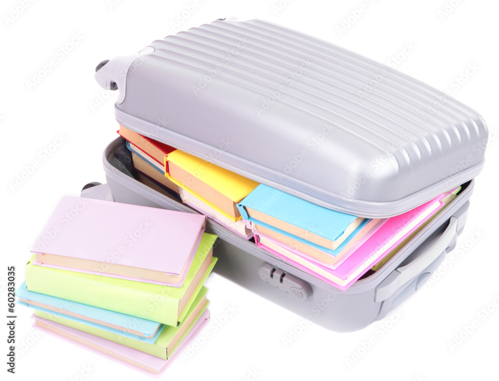 Suitcase with books isolated on white Suitcase with books isolated on white