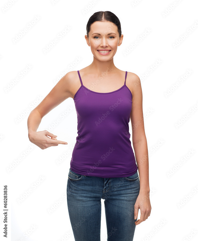 woman in blank purple tank top pointing at herself