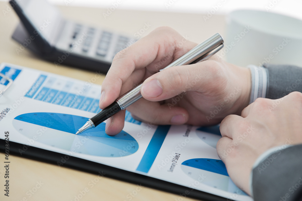 graphs and charts analyzed by businessman graphs and charts analyzed by businessman